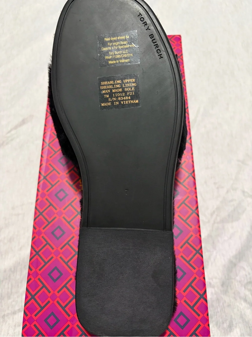 Tory Burch Black Faux Fur Slide with Gold Logo